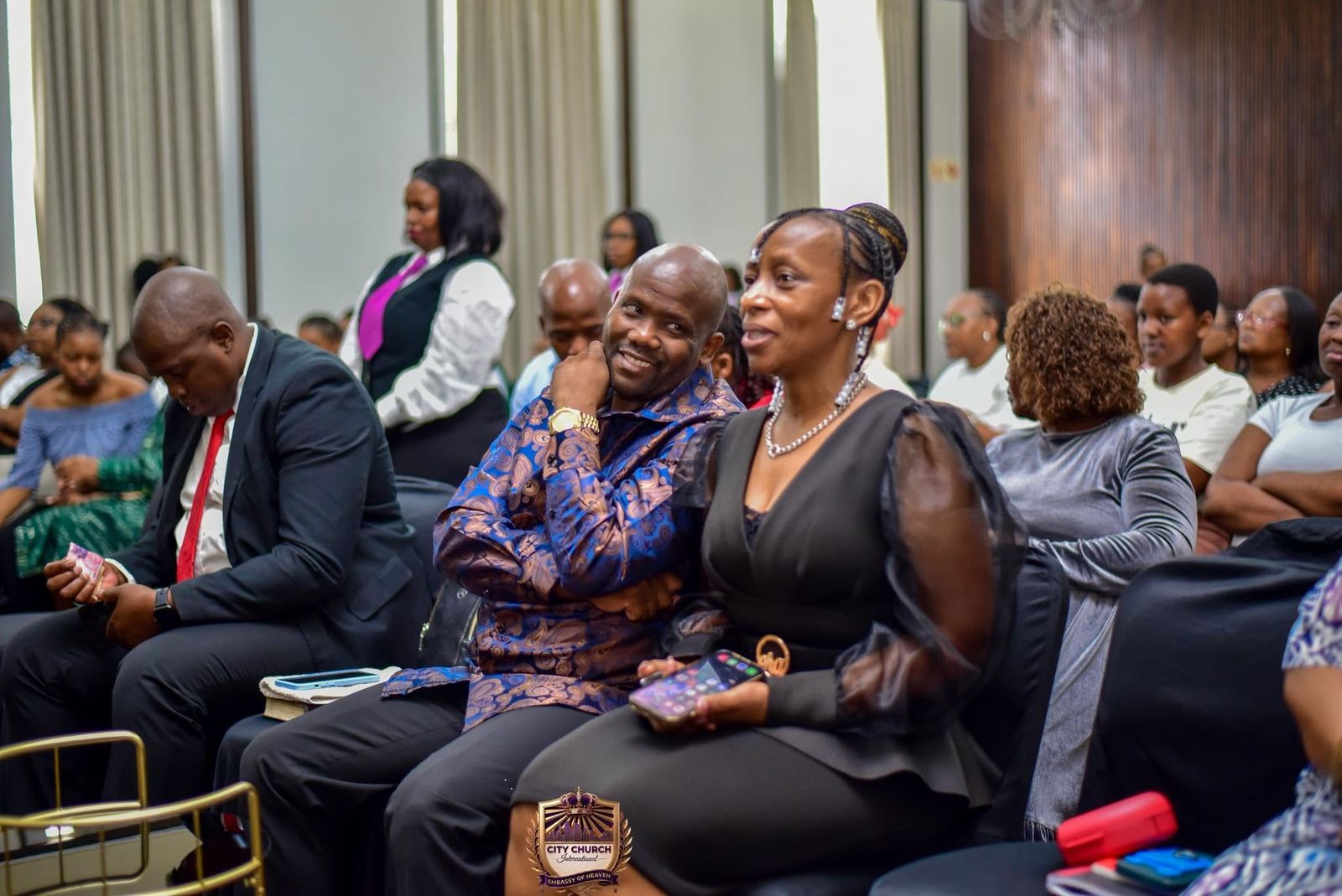 Members sharing a moment during the service