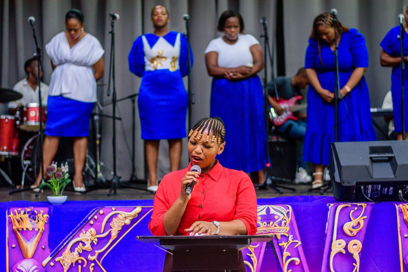 Leading praise in front of the worship team