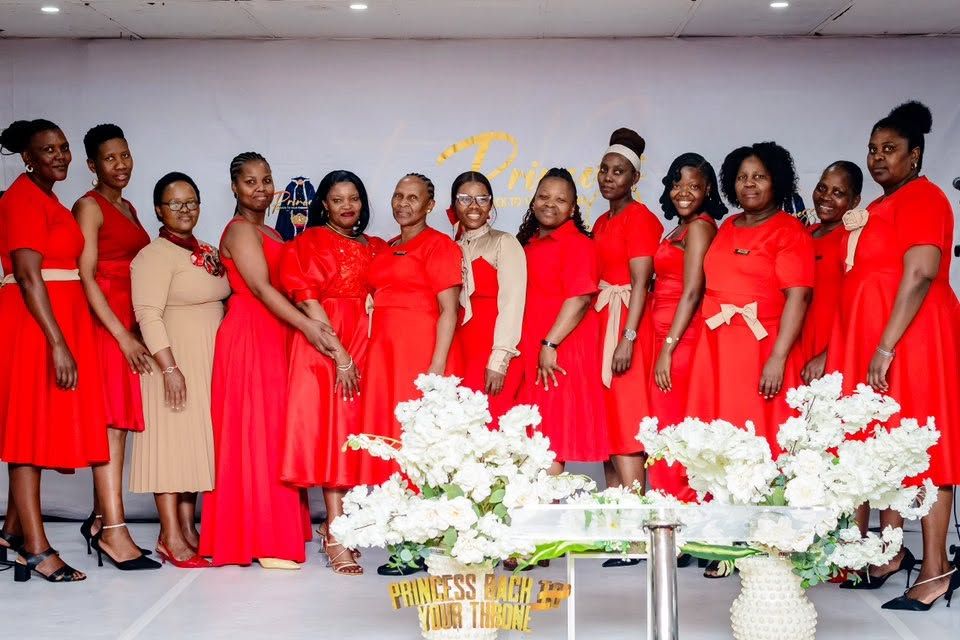 Women dressed in red at Princess Back To Your Throne